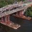 Старый Афанасьевский мост в Воскресенске, не разбирая, отправили на барже по реке - MosRegToday.Ru