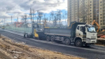 Укладка асфальта завершилась на строящемся путепроводе у платформы «Быково»