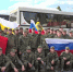 Освобожденные из украинского плена военные развернули флаг России по прилету - MosRegToday.Ru