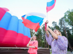 Подмосковье поздравили с Днем государственного флага из космоса